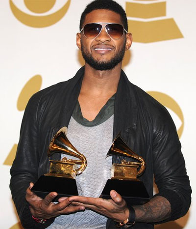 A photo of Usher showing his Grammy.
